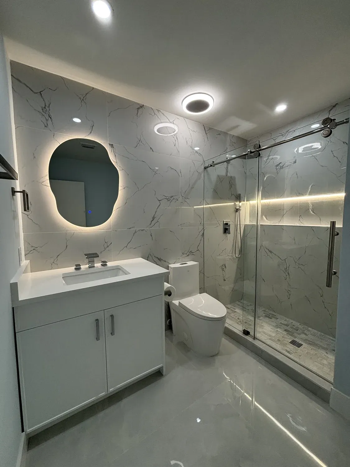 Organic Mirror Marble Bath