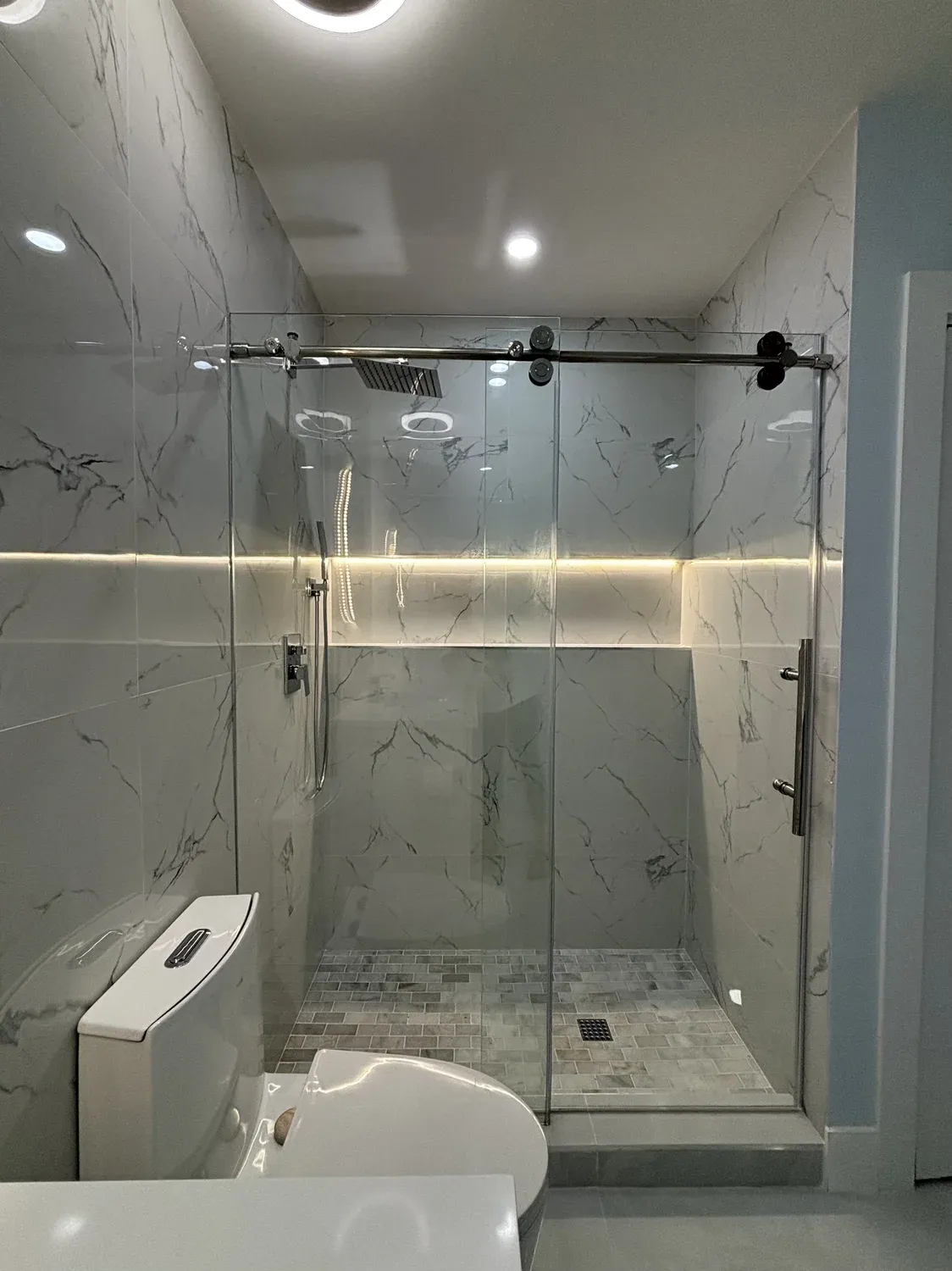 Marble Shower with Sliding Glass