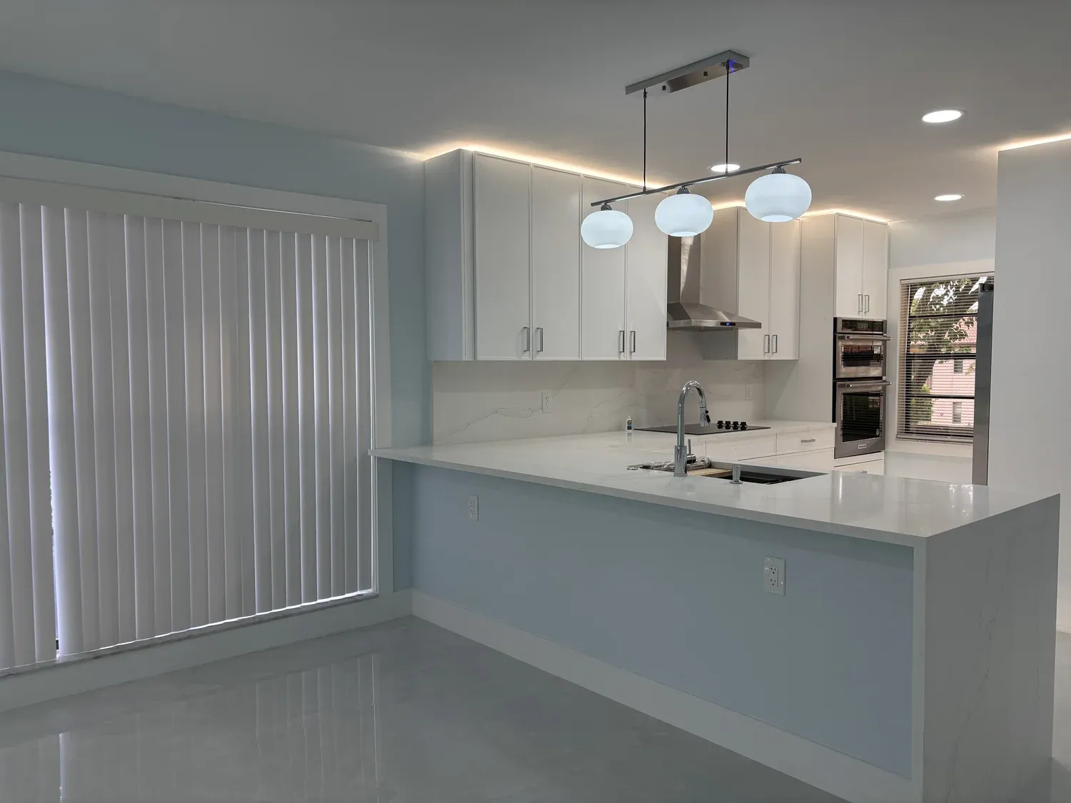 White Kitchen with Peninsula