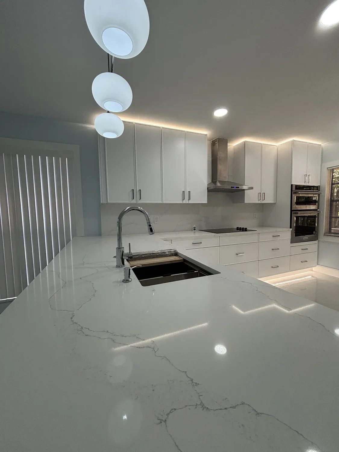 White Kitchen with Island Sink