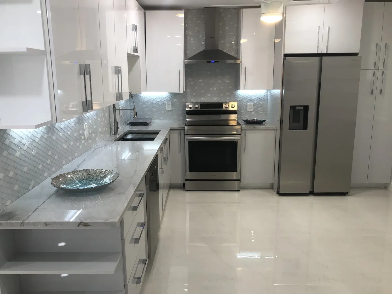 Gray Kitchen with Glass Tile Backsplash